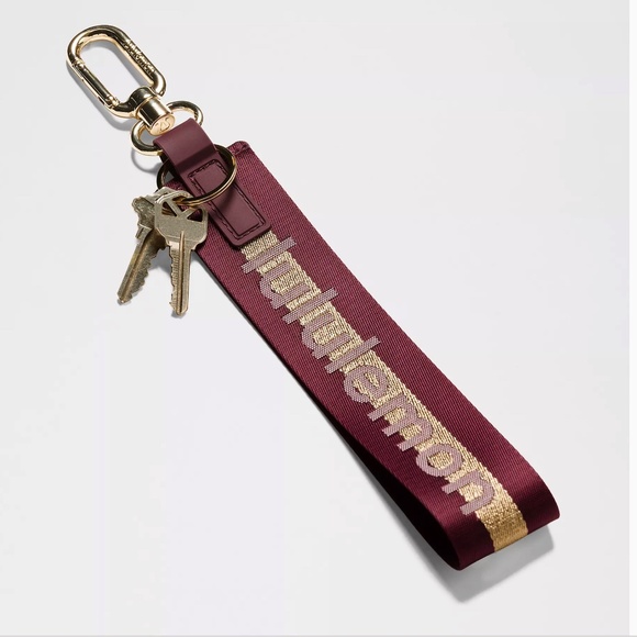 NWT  Lululemon Never Lost Keychain Wordmark in Deep Luxe/Gold/Bone - Picture 4 of 4